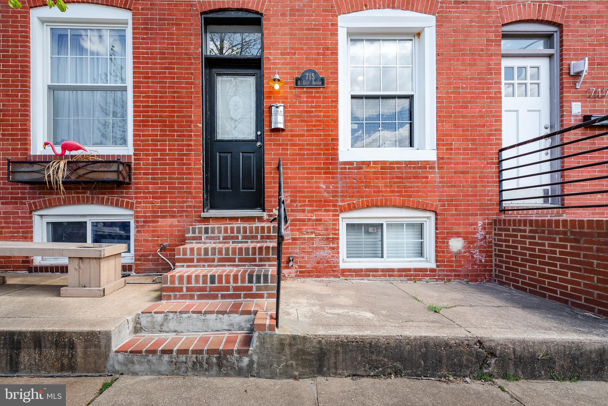 APPLICATION ACCEPTED 10/15/24 - PENDING LEASE SIGNATURES. Charming colonial-style row home available for rent in the lively Canton neighborhood with parking for 2 small/midsize cars! Featuring 1,210 square feet, 2 bedrooms, and 3 full baths. Step into the generous main level, where you'll find an expansive living and dining area adorned with stunning hardwood floors, a classic exposed brick wall, and a sleek modern staircase. Proceed to the updated open kitchen, featuring a large center island with a breakfast bar, granite countertops, stainless steel appliances, maple cabinets, ceramic tile flooring, and convenient outdoor access. Go to the upper level, where you'll find hardwood floors, a dedicated desk area, and skylights illuminating the hallway. The expansive owner's suite features charming exposed painted white brick, while the additional bedroom provides generous room and hardwood floors. The finished lower level includes a family room with tile flooring, a full bathroom, exposed brick accents, laundry, and storage area. Enjoy the convenience of private parking for 2 cars and space for outdoor dining and entertaining on the back lot. The sought-after and vibrant Baltimore neighborhood of Canton offers a rich blend of eclectic dining and shopping, scenic parks, cultural attractions, and historic charm. FRESHLY PAINTED, CLEANED & LR/DR HARDWOOD FLOOR REFINISHED AS OF 9/5!