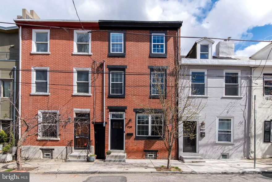 Enjoy everything about city living wrapped up in over 1700 sq ft of classic Philly charm in this beautiful 3 Bedroom, 1.5 Bath home in the heart of Northern Liberties. The brand new front door welcomes you before entering through the vestibule into the handsome Living Room with exposed brick, original hardwood floors, and brick fireplace with intricate wood mantle. The rustic pine floors continue to the adjoining Dining Area, perfect for entertaining, and the adjacent Half Bath. The spacious, updated Kitchen boasts granite countertops, new stainless steel appliances purchased in 2021, and neutral tile floor, leading to the expansive back garden with brick patio, mature trees, and rear alley access.  Head upstairs to find the first of two vintage fireplaces on this level. A spacious Bedroom, with second original fireplace featuring double closets, a smaller Bedroom perfect for an office, and a Full Bathroom with glass enclosed shower, double vanity, and classic clawfoot tub complete the second floor.  Another flight up leads you through a small foyer to the renovated Primary Bedroom with lofted ceiling, exposed beams and brick on two sides. Easy access to the sizable third story roof deck, make this ample space ideal for unwinding after a long day. Truly, your own private escape from the hustle bustle.  Located directly across the street from Liberty Lands Park & playground. Blocks from, Heirloom Market, Oneshot Cafe’, Vet (new 2022), doggy daycare, dry cleaners, North Bowl bowling alley, great fooderies, retro shops, multiple gyms, AND just inches from your cool new neighbors, block parties, Halloween community event and the all popular dog costume parade! Make this incredible home yours today!

 OPEN HOUSE EVERY DAY, CALL FOR TIMES!