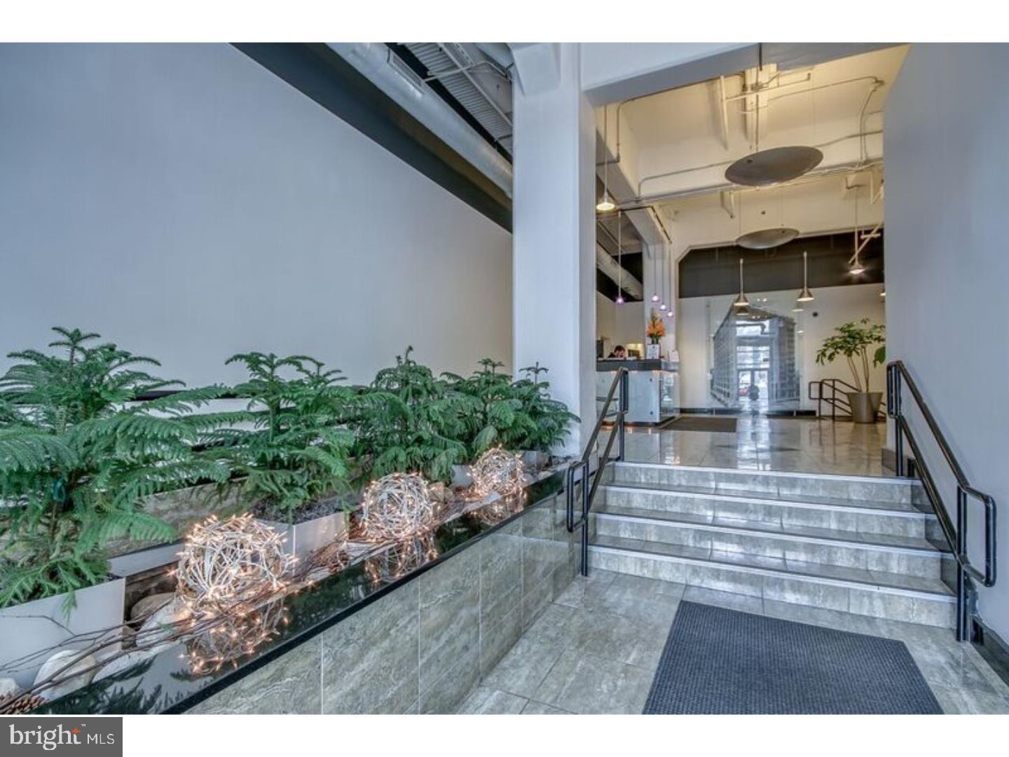 Gorgeous Center City Loft Style Living, in the luxurious Logan Square district. This large 2 bedroom loft features over 1300 sq ft of open and bi-level living space. The unit freatures 17ft ceilings, w/exposed brick and a Center City View. Beautiful Oak Hardwood flooring, Master Bedroom with Carrera Marble & Jacuzzi Bath, Extra Storage in-unit. incredible Kitchen features Custom Cabinets & Granite Countertops and also has a center island. Oversized windows with a Center City View. Indoor garage parking. Commercial retail spaces include a gourmet deli, dental spa, indoor resident fitness center. Schedule an appointment today to live in this wonderful building that has 24 hour Doorman service.