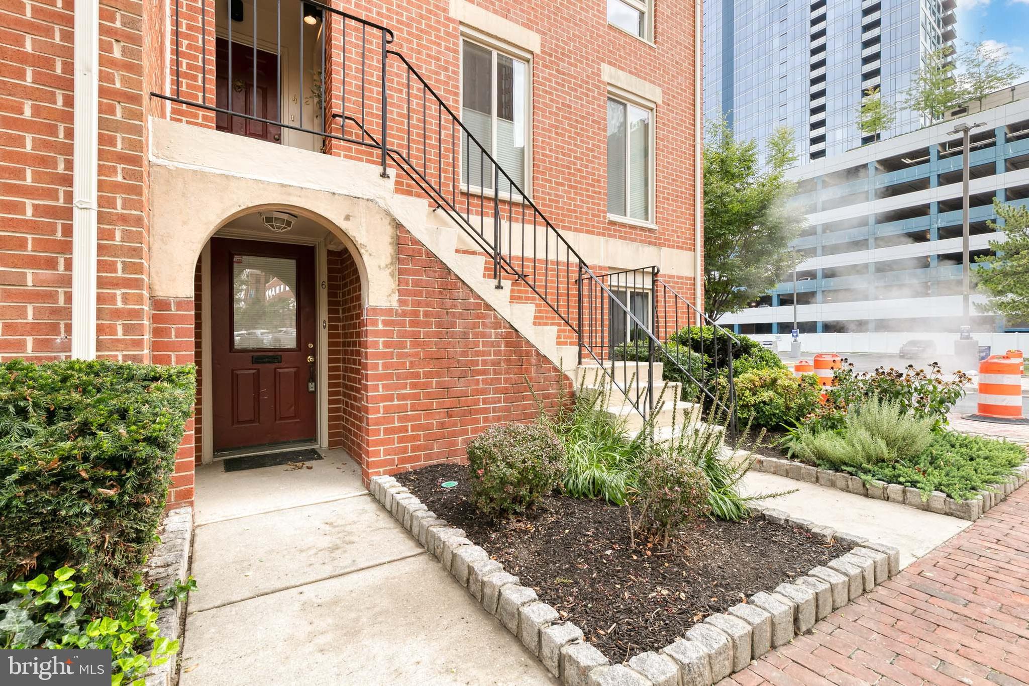 Tenant occupied and requires 24 hours notice for showings. Incredible opportunity to live in sought after Otterbein. This modern patio level condo offers a true open concept with a cozy wood burning fireplace, trendy rustic LVP flooring, spacious kitchen with plenty of cabinet and counter space, and neutral grey tones throughout. This is truly an entertainer's dream! The primary bedroom suite has generous closet space & a private fully renovated bath. The 2nd bedroom is spacious and could be the perfect guest bedroom, office, or roommate situation. The 2nd bathroom has also been completely renovated and has a modern farmhouse feel. There are lush community green spaces and 1 assigned parking space included!
