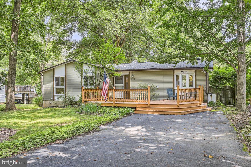 The possibilities are endless for this 4-Bed & 2-bath Rancher located on a quiet tree-lined street in Columbia.  Just waiting for the right buyer to add some sweat equity & imagination, and you could be stepping inside your dream home!  Pull into the oversized driveway and make your way to the large front deck that overlooks the park-like yard and neighborhood. Inside you have an open concept family and dining rooms, ideal for entertaining.  A large living room with a brick fireplace is just past the kitchen and the convenience of main floor laundry.  Down the hall are three spacious bedrooms and a full bath.  The lower level offers additional living space with the 4th bedroom with its own full bath, a family room, and a large unfinished storage room.  From the den a sliding door takes you onto another large wood deck that looks out over more green space, shade trees, and a storage shed. This home has a roof that’s <10 years young, and a new on-demand water heater, and has amazing proximity to shopping, restaurants, and commuter routes.
