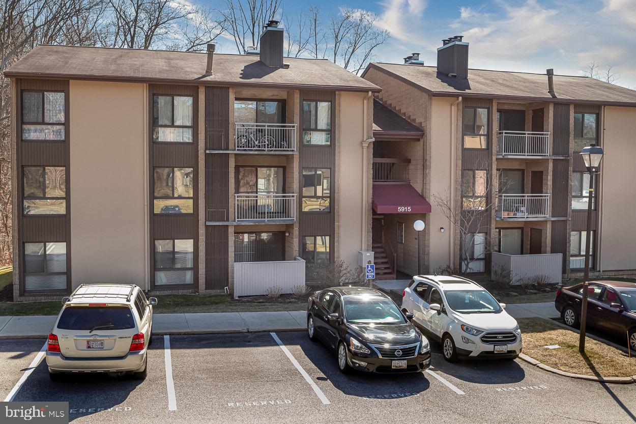 Completely Refreshed & Captivating Condo in the Village of Long Reach. This 2BD/1BA Flat has everything you need to feel right at home! Soak up the natural light that pours in through the huge black framed window boxes that highlight the rich Luxury Vinyl Tile throughout this home. Enjoy cooking a good meal in the new Gourmet Eat-In Kitchen with white shaker cabinets, granite countertops, and stainless steel appliances. Relax in the living room trimmed in crown molding complete with ceiling fan, cozy wood burning fireplace, gorgeous wood mantel and slider to your private balcony. Retire at the end of the day to the generously sized Primary Bedroom including a walk-in closet with lighting and ceiling fan. Second sizable bedroom with large closet. Full bath with new vanity and trendy fixtures. Separate laundry area with convenient shelving. Parking passes for 2. Enjoy living in close proximity to all of the amenities that Columbia has to offer! Enjoy the Walking Trails, Blandair Park, Columbia Crossing, The Mall in Columbia, and Merriweather Post Pavilion. So many shopping, dining, entertainment, and outdoor recreation options to explore. Must See!