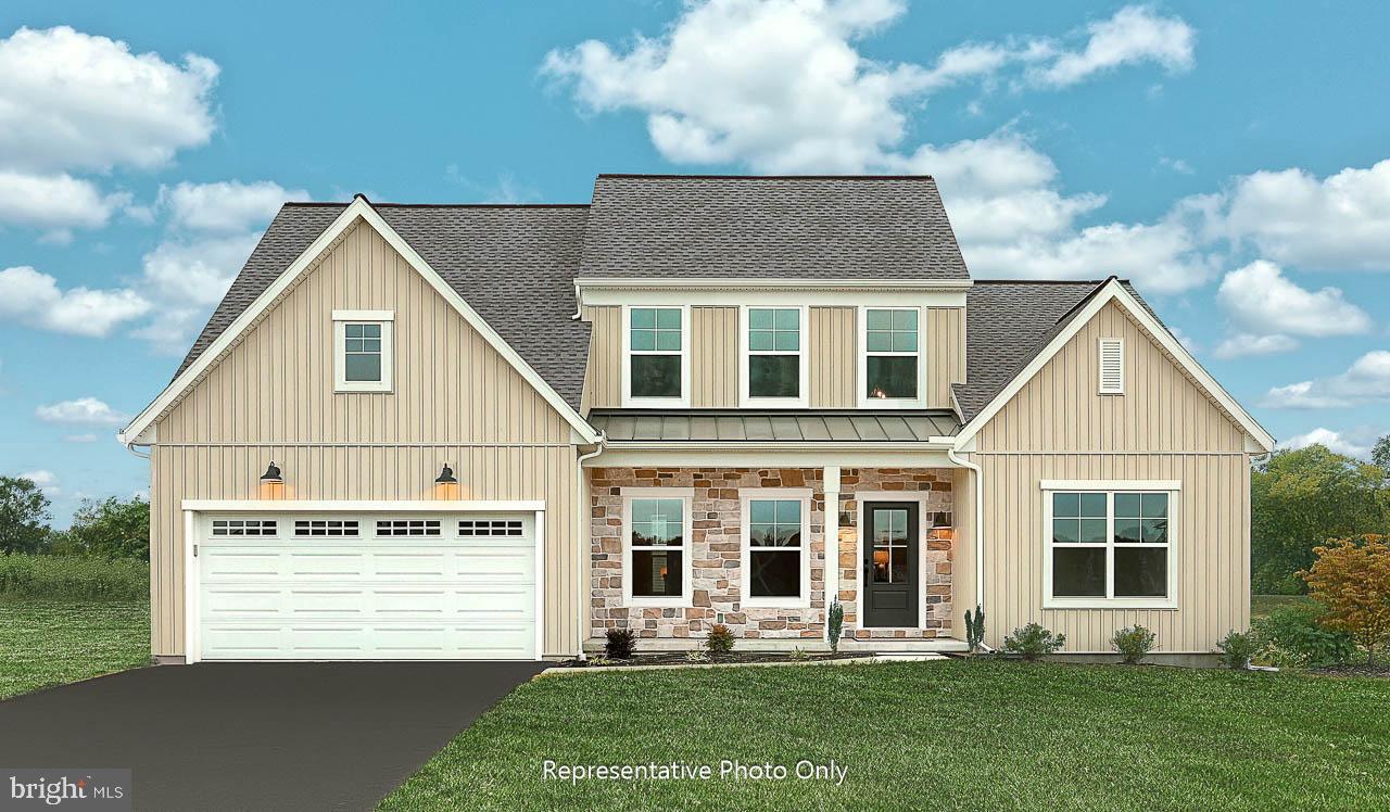 This thoughtfully designed 2-story home with a first-floor owner’s suite features an inviting front porch, a grand 2-story foyer, and 9’ ceilings on the first floor. The 2-car garage opens to a mudroom complete with built-in lockers and laundry room access. Stylish vinyl plank flooring flows from the foyer to the main living areas with a carpeted study to the front of the home. The formal dining room opens to the kitchen, well-appointed with stainless steel appliances, quartz countertops, a tile backsplash, and a large pantry. The sunny breakfast area provides access to the rear patio. Adjacent to the kitchen is a bright, 2-story family room, warmed by a gas stone fireplace. The spacious owner’s suite on the first floor includes a private bathroom with a tile shower, double bowl vanity and an expansive closet. On the 2nd floor are 2 additional bedrooms, a full bathroom, and loft space.