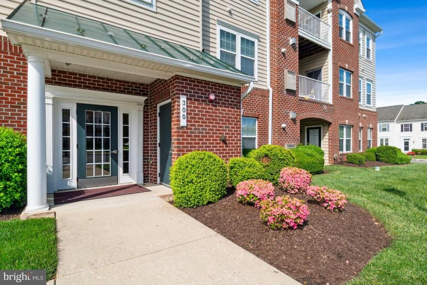 Welcome to the Monmouth Meadows community! This one of a kind, ground level/SEPARATE ENTRANCE updated 2 beds 2 full bath is just waiting for its new owner. There is absolutely nothing to do on this one but move in and live. The seller has upgraded everything throughout when she purchased from the builder. 2 huge bedrooms with plenty of closet space and an open concept kitchen/dining room/living area and office with walk out ground level and patio with storage. Newer appliances.- fresh paint and carpet.-updated bamboo flooring in sunroom/office. The kitchen cabinets and kitchen finishes are all builder upgrades. Tons of natural light! 2 parking spots. one right near the private entrance. Secured building. POOL-CLUBHOUSE-PLAYGROUND! Hurry Hurry!