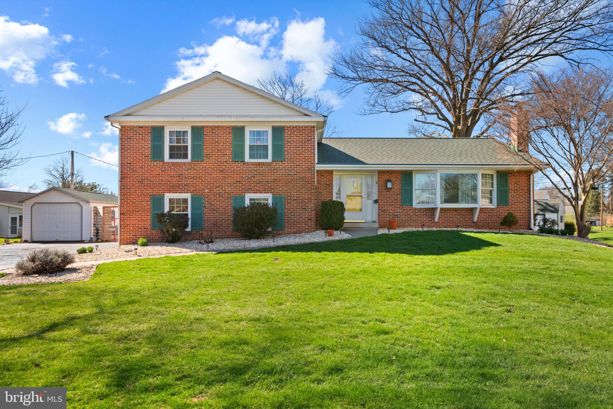 This approximately 1,900 square foot home is situated on an approximately 0.34 acre lot. Featuring three bedrooms and two and a half bathrooms, the primary bedroom offers ample space and includes an en-suite bathroom. The two additional bedrooms are well-proportioned and provide flexibility for a variety of uses. There is another full bath on the upper bedroom level of the home and a half bath conveniently located off of the family room on the lower level. The kitchen is equipped with essential appliances and ample counter space, creating an efficient workspace. Need extra parking? Other highlighted features include a larger shed that is actually another garage, the sun porch overlooks a beautiful back yard, not to mention the location of the home on a cul-de-sac across from the high school.