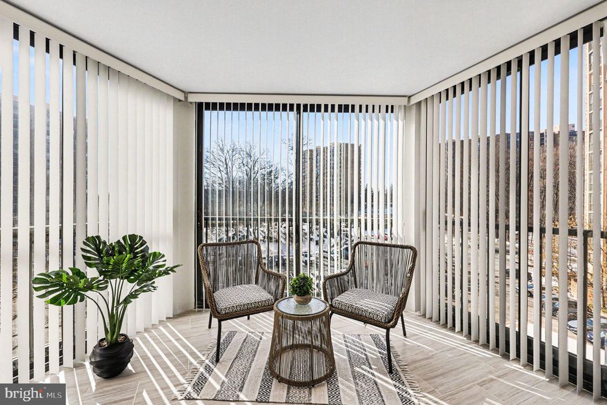 Renovated 1BR + den or 2 bed (den has window & closet) with 1.5 baths and one of the building’s few premium garage spaces (#117). This oversized space provides extra square footage, making parking and unloading effortless — and it’s steps from the elevator. These rare spots trade at a premium because they’re easier to use, safer for vehicles, and more convenient for groceries, luggage, and mobility needs.
2025 renovations include wide-plank natural wood–tone luxury vinyl flooring, new full-height shaker maple cabinetry, granite counters, sleek neutral backsplash, and newer kitchen appliances. Fully renovated baths, including a spa-style shower with tile surround and built-in bench. Another great feature of this condo is the enclosed porch off the living room — adding bright, flexible space with floor-to-ceiling windows for relaxing, plants, reading, or year-round enjoyment. Also included is a separate storage unit (full height, near the garage space).

Well-managed community with strong reserves and resort-style amenities: restaurant, convenience store, bowling, game room, party rooms, hair salon, tennis, pickleball, indoor/outdoor pools, basketball, dog park, BBQ areas, playground, and EV charging.

Fantastic location — short walk or shuttle to Huntington Metro, and quick access to Old Town, the Woodrow Wilson Bridge, shops, dining, and commuter routes.