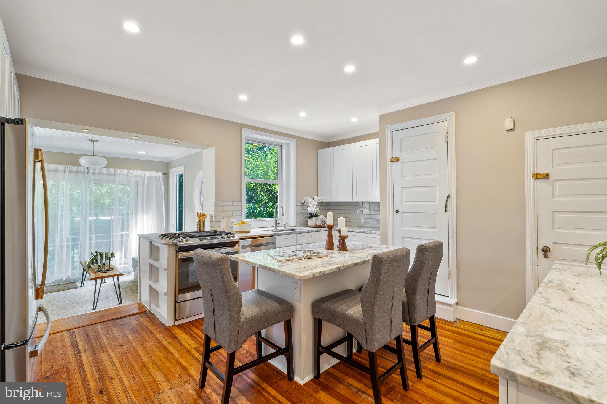 4215 Pine Street is the one you’ve been waiting for. Located in the highly sought after Penn Alexander School catchment, this home features more than 4000 sq ft of move-in ready living space that’s the perfect blend of preserved historic character with modern amenities: two car detached garage parking; 7 bedrooms & 2.5 baths; 3 fireplaces; a brand new kitchen and newly renovated bathrooms; formal dining room and three distinct living/entertaining spaces (on the main floor, on the second floor, and in the basement); second floor Primary Suite with an adjacent brand new Changing Room & upstairs laundry machines; 4 more bedrooms with a brand new bathroom on the third floor; fully finished walkout basement with a wet bar & finished storage room; 4 private outdoor spaces (a beautiful courtyard, an elevated garden on top of the detached two-car garage, and two covered porches in the front and back of the home); an additional approx 1000 sq ft of attic storage; secondary stairwell that can be modified to add more storage or to install an elevator; a gorgeous Sunroom with heated floors adjacent to the kitchen; dual zoned HVAC, upgraded electric… and all of this is situated on a beautiful and quiet tree-lined block in the heart of Spruce Hill. Just steps from CHOP, University City, the University of Pennsylvania and Drexel, Clark Park, Green Line Cafe, and the shops & restaurants along Baltimore Avenue, homes this nice and this big in this neighborhood don’t come around too often. Schedule your showing today.
