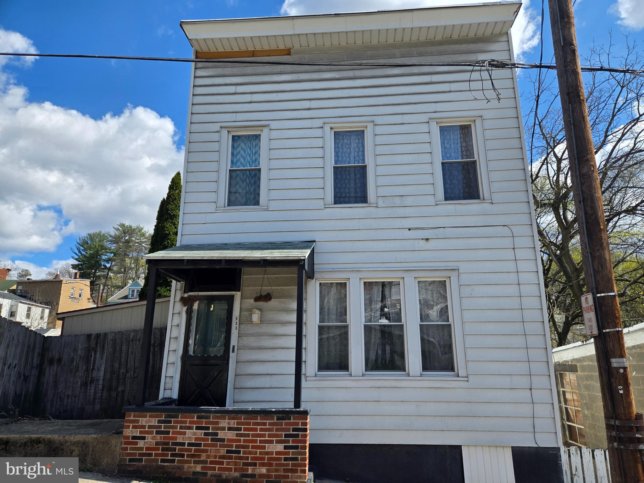 This is a 2 unit apartment building and with a little work it will be ready for new tenants! Spacious room sizes and off street parking available in the 2 car garage. 1st floor apartment is 1 bedroom. 2nd floor apartment is a 2 bedroom .Property is being sold as is where is. This could be made back into a single family home as well. Call today for a showing!