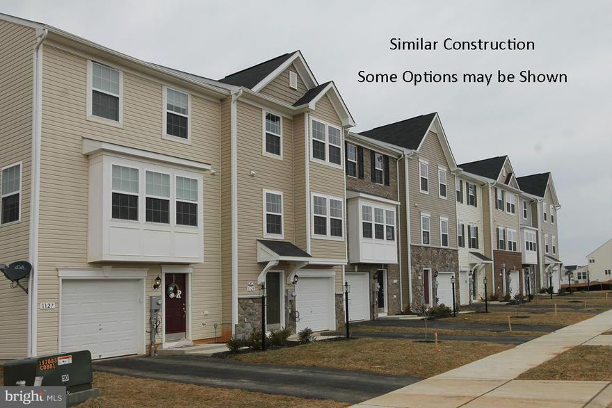 Dan Ryan Builders at Stonebrook Village offer this York II garage townhome finished on all 3 levels with lots of stylish features like stone front detail & 2 story box bay windows, stainless appliances in the island kitchen, deluxe master bath & walk in closet, walkout lower level rec room! Convenient to I81 for your commute to MD destinations & nearby shopping.  Ask about closing cost help!