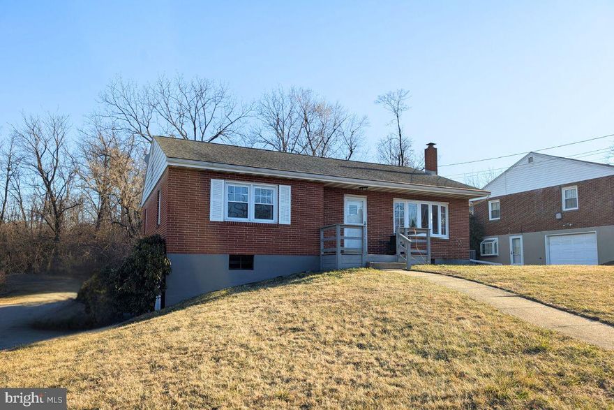 This recently updated, move-in ready 3-bedroom, 2-bathroom rancher in Muhlenberg features a great kitchen with granite countertops, a newer covered deck, a lower-level bedroom, garage, and a spacious private backyard.