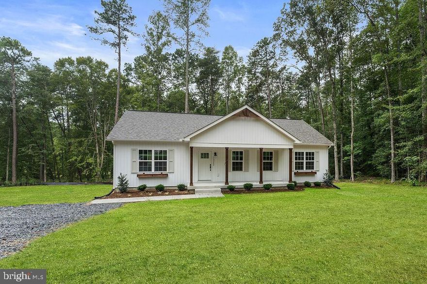 Completed New Construction – The Boxwood by Ironwood Homes on 4.25 Acres
Welcome to The Boxwood, a stunning new ranch-style home that blends modern elegance with timeless country charm. Thoughtfully designed for comfortable living, this home features an open-concept floor plan that fills every room with natural light and creates a bright, airy atmosphere.

Inside, you’ll find three spacious bedrooms and two full baths, including a luxurious primary suite with a spa-like bathroom featuring a free-standing tub and designer tilework. The kitchen is a true showstopper, complete with quartz countertops, stainless steel appliances, a farmhouse sink, and custom finishes that elevate the entire space. Exposed beams, hardwood floors, and stylish light fixtures add warmth and character throughout.

Set on 4.25 acres, this property offers privacy, space, and endless potential for outdoor enjoyment. With countless upgrades and a custom feel in every detail, this home is truly one-of-a-kind. Don’t miss the opportunity to make it yours!