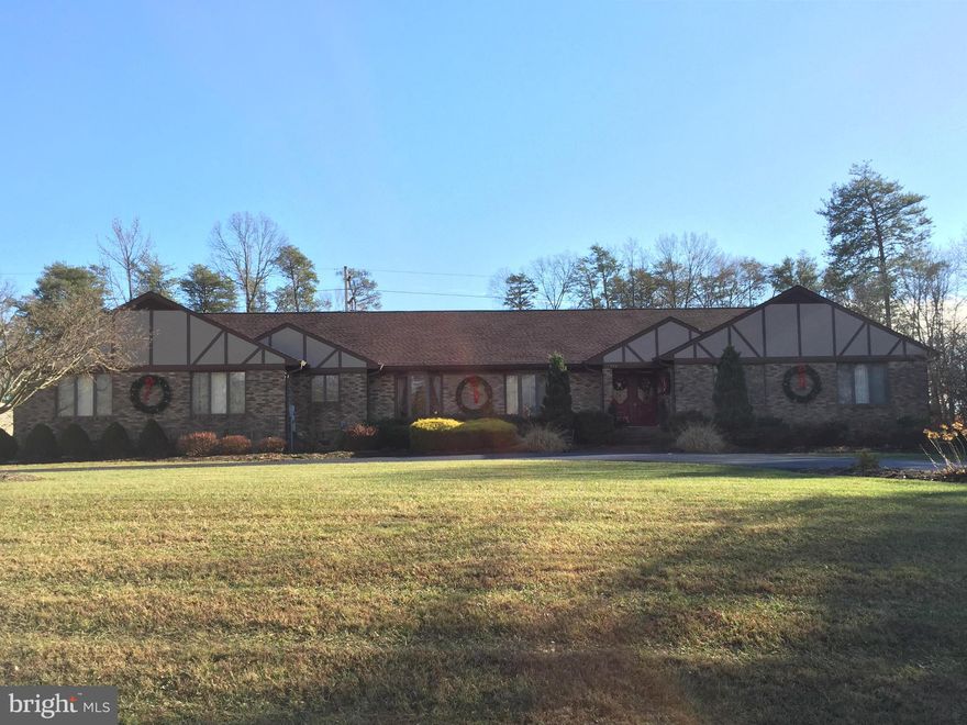 STUNNING*JUST ABOUT EVERYTHING UPDATED*ALMOST 3500 SQ FT OF LIVING SPACE*GREAT FLOOR PLAN FOR ENTERTAINING*LARGE KIT OPENING TO FAM RM &  FLORIDA RM*MASTER W/UNBELIEVABLE BATH*SEP DR*3+ CAR ATTACHED GAR W/HEAT & A/C*OFFICE IN GAR W/HEAT & A/C*DETACHED BUILDING WITH ELECTRIC & WINDOW A/C*12X40 RV or BOAT CARPORT*3.15 ACRES*CIRCULAR DRIVEWAY*IN LA PLATA SCHOOL DISTRICT*HOME IS TRULY MOVE IN READY