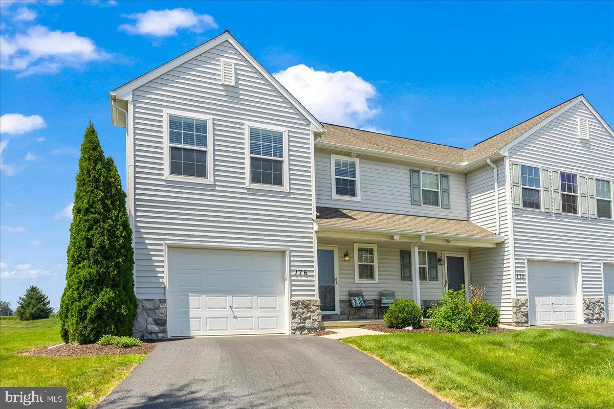 This super clean, beautifully maintained 3-bedroom, 2.5-bath end unit townhome is a standout in the desirable Village of Springbrook Farms. Located in the sought-after Palmyra Area School District and just minutes from the Hershey Medical Center, major highways, and the Pennsylvania Turnpike, this home checks all the boxes for convenience, comfort, and peace of mind. One of the few homes with its own private driveway, it also backs to open space—no rear neighbors, just wide-open views and quiet. The community is professionally managed, with all exterior maintenance—including lawn care , snow removal and trash—covered by the Condo Association, giving you more time to enjoy low-maintenance living. The main level features an open-concept layout with the kitchen, living, and dining areas flowing seamlessly together—perfect for everyday living and entertaining. Upstairs includes a convenient laundry area and three spacious bedrooms. The full unfinished basement comes with an egress window, giving you the option to add a future bedroom or extra living space.
Step outside to enjoy your private patio and explore a walkable community with scenic walking paths—perfect for morning strolls or evening unwinding.