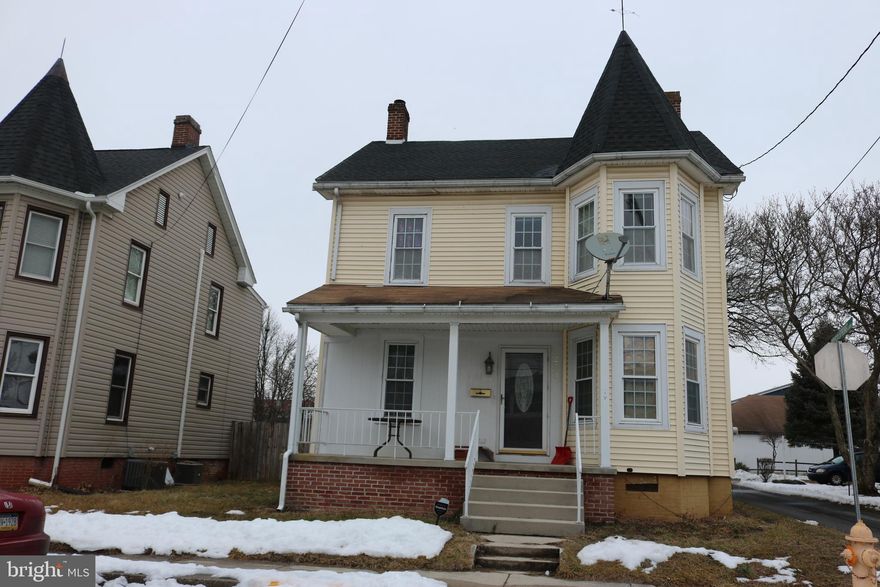 Victorian home has off street parking and fenced yard. 4 bedrooms, 2 full baths. Potential for 5th bedroom in finished attic space. Main floor has living room with woodstove, and a Great room with patio doors to deck.  Separate dining room,  and full bath off kitchen.  Covered front porch. Attic and 2nd floor heated with electric baseboard heat. Great room has electric baseboard heat, rest of first level is forced gas heat.