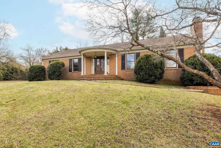 This classic all-brick ranch sits on an elevated, level lot in the private northern section of Carrsbrook?one of Charlottesville?s most established and convenient neighborhoods. With timeless curb appeal and a versatile floor plan, the home offers comfort, flexibility, and abundant natural light. The centerpiece is the sun-filled sunroom with wood stove, overlooking the private backyard and seamlessly extending the main level living space. The main floor also features spacious living and dining rooms with large windows, a well-appointed eat-in kitchen, and generously sized bedrooms. The finished basement adds valuable living area with two large bedrooms, a full bath, a rec room with a gas fireplace, and ample storage. Recent updates include newer HVAC, updated electrical panel, newer kitchen appliances, refinished wood floors, newer windows in the sunroom, gas fireplace, and newer basement carpet. Just minutes to UVA, the airport, shopping, schools, and downtown, this Carrsbrook gem combines classic charm with modern convenience?and plenty of space for everyone to spread out.,Fireplace in Living Room