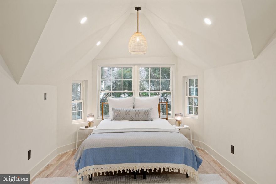 Nestled at the intersection of West Mt. Airy and Germantown, this beautifully renovated semi-detached 3-bedroom, 2.5-bath home blends classic architectural charm with thoughtful modern upgrades and high-end finishes throughout.

A covered front porch welcomes you into a light-filled interior where graceful archways, hardwood flooring, and curated design details create an inviting, cohesive flow from room to room. The living area is enhanced by European lime-wash walls, adding depth, texture, and a soft, organic feel—crafted from natural, chemical-free materials for a healthier indoor environment.

The kitchen is both stylish and functional, featuring  Taj Mahal quartzite countertops, handmade zellige tile backsplash, stainless steel appliances, and built-in Hardio speakers that extend seamlessly into the living area—perfect for entertaining or everyday living. The adjacent dining space and open sightlines create a warm, connected atmosphere.

The finished lower level adds valuable flexible living space, ideal for a media room, home gym, or office, along with the convenience of a half bath and in-home washer and dryer. Whether used for everyday functionality or additional entertaining space, this level enhances the home’s versatility while maintaining the same thoughtful design and comfort found throughout.

Upstairs, the spacious primary suite continues the home’s refined aesthetic with lime-washed walls and an en-suite bath. Two additional bedrooms and a full hall bath provide flexible space for guests, home office, or growing households.

Outside, enjoy a private patio area ideal for morning coffee or evening gatherings along with a spacious backyard, all within a tree-lined neighborhood known for its blend of historic character, vibrant local businesses, and convenient access to both Mt. Airy and Germantown amenities, parks, and regional rail.

This is a rare opportunity to own a move-in-ready home where craftsmanship, natural materials, and modern comfort come together in one of Northwest Philadelphia’s most desirable locations.