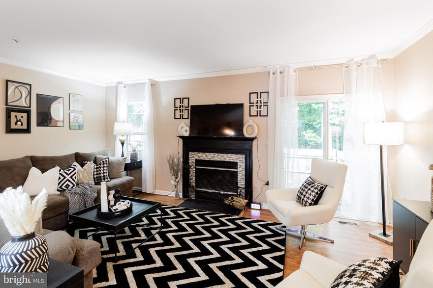 This spacious 3-bedroom townhome offers the convenience of 3 en suite bathrooms, providing privacy and comfort for each bedroom. Located in a private community, it is conveniently situated less than 10 minutes away from Route 50 and only 30 minutes away from downtown DC, making it an ideal location for commuting. The backyard of the townhome offers a secluded and peaceful retreat. Inside, the townhome boasts ample interior space, providing plenty of room for living and entertaining. The main level features hardwood floors, adding a touch of elegance to the living space. The kitchen is equipped with new appliances, including a stove, and refrigerator, ensuring modern conveniences for everyday living. Additionally, the townhome offers other desirable features such as new wall-to-wall carpeting, a new furnace, a new A/C unit, and washer, and dryer,  enhancing the comfort and functionality of the home. Parking is convenient with a one-car driveway, a garage, visitor parking, and street parking available. Overall, this townhome offers a combination of comfort, convenience, and modern amenities in a desirable location. (Property has been appraised)