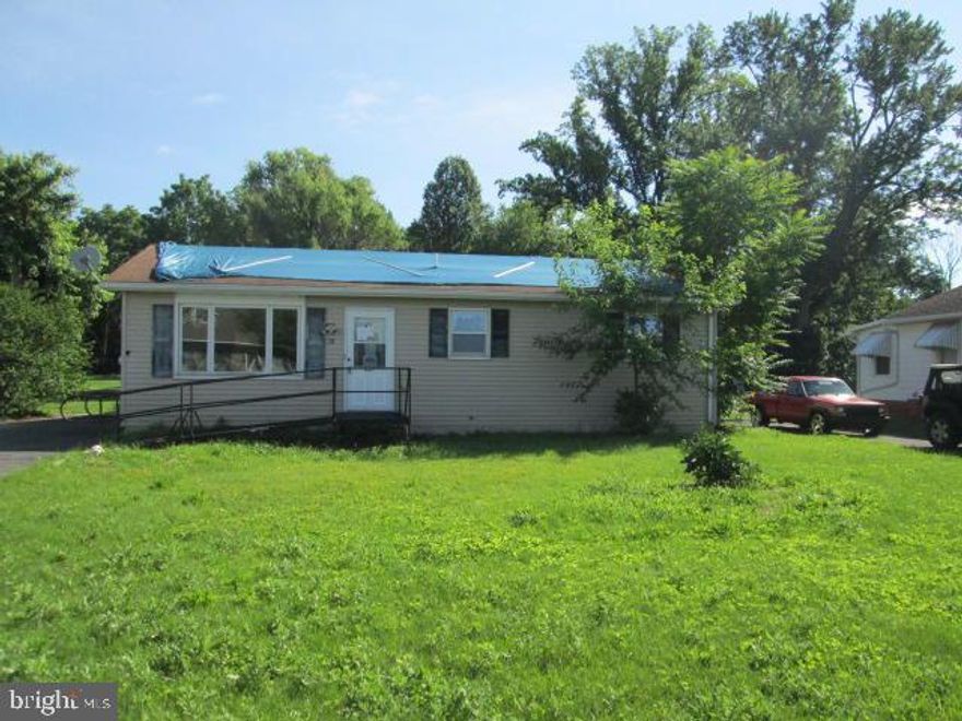 1 story detached home on a level lot with country views. Features a spacious kitchen, 2 full bedrooms and 1.5 baths with a full basement. Property needs a lot of TLC.