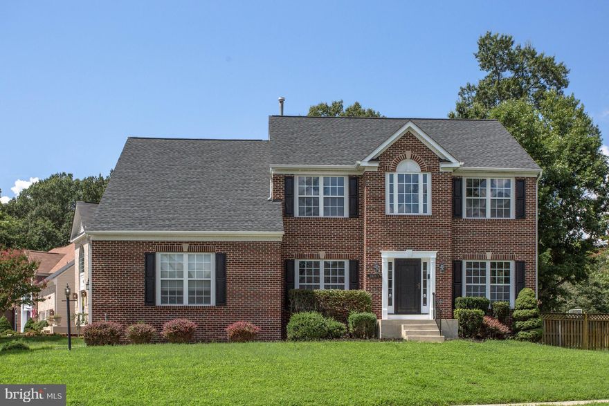 LOWERED! TASTEFULLY RENOVATED! Come see this stunning 4 bedroom 3.5 bathroom brick front single family home! Features hardwood flooring on top 2 levels and carpet in basement, along with brand new SS appliances, eat-in kitchen, new paint throughout, and a beautifully finished basement with a wet bar to entertain. MUST SEE!! Will not last on the market for long!