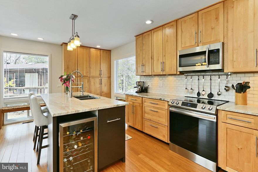 Gorgeous, renovated Contemporary home in Popular TRURO!!  Walls opened to Stunning, Bright new Kitchen 2023-  Maple Cabinets, Fantasy Marble counters, Stainless appliances!  Home in excellent condition!!  High Quality Strand Bamboo floors w/new baseboards on main level and pretty hardwood floors on bedroom level**Large Main floor family room  w/Vaulted Wood Ceiling & Masonry Fireplace!  Beautiful Wall of Windows in LR & Fam Rms overlook huge rear yard**  Laundry & Mud rooms on main level** 4 Bedrooms & 2 bull baths on upper level**Many windows have been replaced including NEW large dining room window 2024 **  Renovated baths with skylights!   NEW HVAC system 2024 & water heater 2023!!  Interior freshly painted 2023** Lower level is mostly finished  -- Rec Room has built-in cabinets, A den Plus amazing storage! Created Mud room from garage into house 2024 2 Car Garage with storage**The most wonderful mature treed lot - very private.  Rear Stone Patios and  wood Deck!  Popular Truro is an amazing community with 40+ acres of wooded and open parkland with paved paths, bridges, creek & Playgrounds, Sports courts  Basketball courts, Tennis, Pickleball!  Award winning Swim and Dive teams, Clubhouse for members use!  This is a dynamic, active community!!