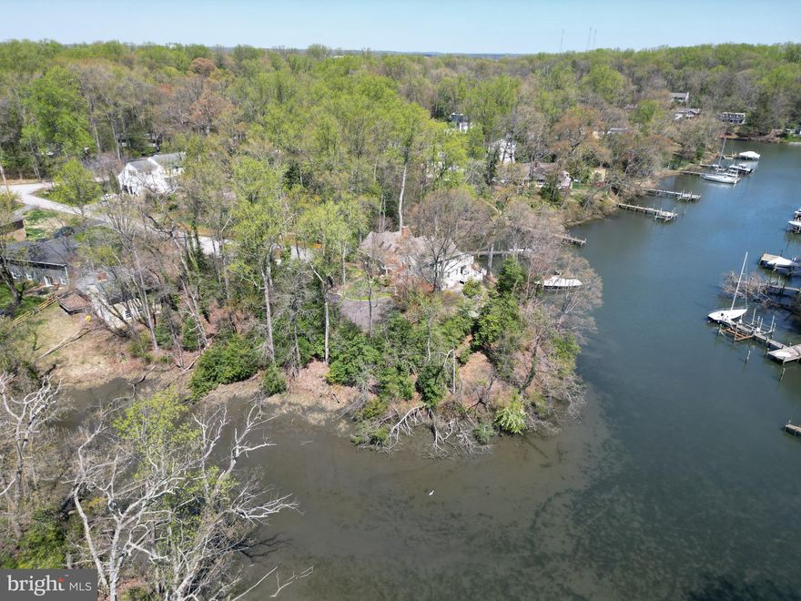 Build your dream home on this rare .47-acre wooded waterfront lot in Annapolis Roads. Located on a quiet cul-de-sac, this property offers privacy, nature, and scenic views. Enjoy the variety of waterfowl, wildlife and ever-changing scenery of Lake Ogleton and surroundings. Bring your architect and your imagination to create your peaceful waterfront retreat.  The elevated lot with 137 ft of waterfrontage provides endless opportunity to maximize the views throughout the property. The coveted Annapolis Roads community features a private beach, pavilion with a fire pit, boat launch, pier, and walking trails. 
With public sewer access, building is easy and the perfect location on Lake Ogleton gives easy access to the Chesapeake Bay and beyond. Or spend the day strolling the close by artful and nautical streets of Eastport to five-star restaurants, pubs and street-end parks. You'll also find yourself minutes from downtown Annapolis and Naval Academy. Annapolis offers the perfect balance of small-town charm and big world sophistication. Located just 5 miles to Rt. 50 and 97 which provides direct access to Baltimore, BWI, Ft. Meade/NSA and Washington, DC. Welcome Home!