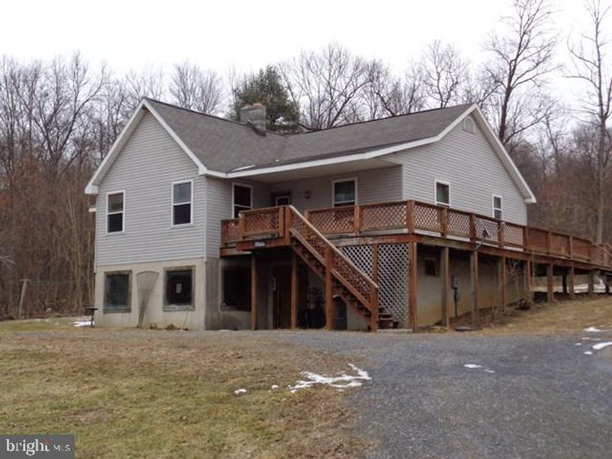 STURDY, WELL-CONSTRUCTED CUSTOM 1 STORY, UNIQUE FLOOR PLAN, LARGE MASTER BEDROOM WITH BATH SUITE, FULL LOWER LEVEL WITH 1 FINISHED ROOM, 2ND KITCHEN, SPACE FOR FAMILY ROOM, LAUNDRY, 3RD BATH.  4 HEAT SOURCES INCLUDE OIL-FIRED FORCED WARM AIR, WOOD BURNING FORCED WARM AIR, GAS FIREPLACE AND FUJITSU MINI-SPLIT HEAT PUMP.  WRAP-AROUND DECK.  PRIVATE SETTING WITH SOME STORAGE AND UTILITY BUILDINGS, FRUIT TREES.  POURED CONCRETE FOUNDATION, FLOOR TRUSS SYSTEM.  MASTER BEDROOM PLUMBED FOR WHIRLPOOL TUB.  24 ACRES ALSO AVAIL.  SLOW ON BENS LANE PLEASE