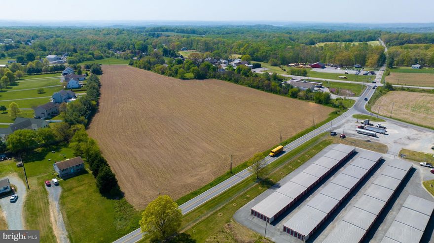 Approx. 20 acres of farm land with great fertile ground. 12+ truck parking lot with 30' x 80' warehouse. Great location for your dream home and horse barn or small farmette. Options are endless! Acreage of this size is hard to come by. Come see this and dream big while it is available! Close to all your major highways and amenities. A few miles from the new Great Wolf Lodge, world's largest waterpark and casino.
