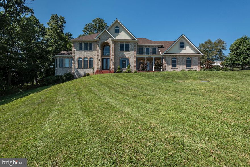 Major price Reduction! 10+++ Magnificent home with European Flair! 8,000+ sq. ft. Three car gar, two story great rm & foyer, library, State-Of-The-Art Kitchen, Huge Master Suite, Heated Yoga room, Exotic flooring, fully finished w/o basement, features; bedroom*2nd kitchen* Steam Shower* Exercise room*2nd laundry rm*New Hardscape Patio and border wall - see pics. All appliances convey.
