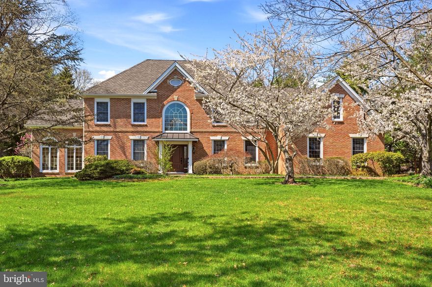 This distinguished Zaveta-built residence is situated within the sought-after Weatherfield community in Upper Makefield Township. The property features an impressive brick façade and occupies a private 1.5 acre lot. A well-designed floor plan provides generous space, with rooms that benefit from ample natural light. The Great Room, featuring a high ceiling and elegant stone fireplace, seamlessly connects to the Gourmet Kitchen, offering excellent flow for gatherings of any size. Custom millwork—including wainscoting, dentil moldings, authentic hardwood floors, and built-in bookshelves—demonstrates a commitment to quality and craftsmanship. The home includes four bedrooms and three and a half bathrooms, highlighted by an expansive primary suite with a remarkable walk-in closet, sitting area, and private bath. Additional features comprise a newer roof, Hardie plank siding, and composite deck. This property represents exceptional value in a premier community, with convenient access to the I-295 corridor for commuting to Princeton, New York City, and Philadelphia.