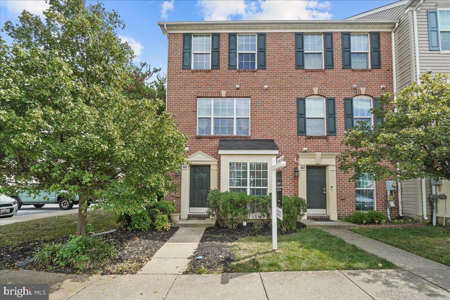 Original owner of the MODEL HOME for Ballenger Creek Center! This 3 level end unit with bump outs has been freshly painted and features new flooring, new stainless steel range, dishwasher and  refrigerator.  This former model has tons of upgrades including recessed lighting,  pecan kitchen cabinetry, Corian kitchen countertops and island, bump outs on all 3 levels, corner gas fireplace in huge family room, enormous walk in closets and cathedral ceiling in primary bedroom suite.  This is an absolute gem and is completely move-in ready!