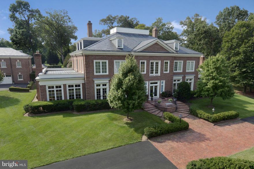 Potomac Falls' finest offering. Meticulously renovated Georgian Colonial of hand made brick, inlaid hardwood floors, plaster moldings, imported fireplaces, sumptuous baths and a sublime chef's kitchen. No detail has been overlooked and no expense spared. Four lush, glorious acres surround a large pool & pool house, tennis court, 2BR/2FB guest house.