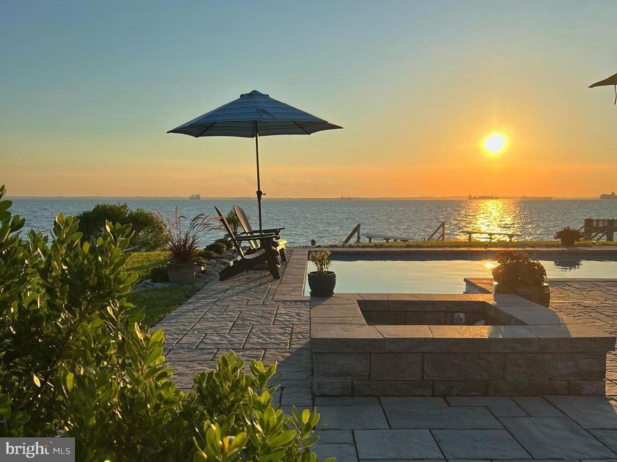 Waterfront Luxury on Kent Island – A Coastal Dream Home Awaits!
Here’s your rare opportunity to own a stunning waterfront retreat in one of Kent Island’s most desirable communities, complete with access to Blue Ribbon Schools. This beautifully updated two-story Cape Cod, crafted by renowned Lundberg Builders, offers over 3,200 sq. ft. of thoughtfully designed living space, featuring 4 bedrooms, 3.5 baths, and breathtaking panoramic views of the Chesapeake Bay from nearly every room.
Nestled on a quiet cul-de-sac just steps from Blue Heron Golf Course, Queen Anne Marina, and a private beach, this home is a haven for those seeking serenity and connection to nature.
Inside, rich hardwood floors flow through the sun-drenched open layout, highlighted by a four-season sunroom, three fireplaces, and generous living spaces designed for both entertaining and relaxing. The chef’s kitchen offers modern appliances and bay views, allowing you to cook and entertain in style.
The primary suite is a private sanctuary, complete with a cozy fireplace, walk-in California closets, and a private balcony overlooking the water – the perfect perch to enjoy nightly sunsets.
Outside, enjoy resort-style living with an inviting pool, beautifully landscaped patio, oversized waterside deck, and a cozy fire pit – all ideal for hosting or simply savoring the peace and beauty of waterfront life.
Perfectly positioned within easy commuting distance to Washington D.C., Baltimore, Annapolis and Wilmington, this residence offers a seamless blend of peaceful escape and metropolitan access.
*Waterfront Living | Golf & Marina Nearby | Top-Rated Schools.
Don't miss your chance to make this Chesapeake Bay dream home yours – schedule your private tour today!