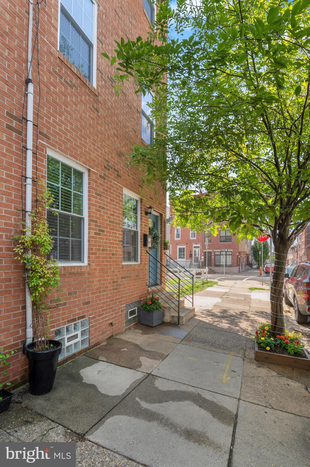 Fully renovated tastefully decorated townhome, ideally located in the heart of Point Breeze, this home features three floors, two and one-half new bathrooms, three fabulous bedrooms, a large beautiful kitchen, a wonderful patio, a third floor deck off of the office and a fully finished basement. Enter into the large family room with bamboo flooring. The family room flows into pleasing dining room. The dining room flows into the spacious kitchen, separated by a granite island. Beautiful white cabinets, premium granite countertops, splendid backsplash, and lots of storage create an ideal gourmet kitchen. This gourmet kitchen opens to the large and beautiful back patio. Upstairs to the second floor you will find two large bedrooms and a new full bathroom. Up one more flight of stairs to the third floor where this home shines. The office space is ideal because it is filled with lots of natural light and opens to the new deck. Down the hall way is the stunning owners bathroom with a soaking tub and incredible shower. Finally, the owners bedroom is large, and has really large closet space and it is finished with a glass barn door separating it from the rest of the upstairs. The basement is fully finished offering additional living space. It also has a half bathroom. Finally there is a proper built-in wine closet. This home is a little wider than most adding precious space and this home is filled with abundant natural light.

It is within walking distance to parks, shops, grocery stores and more. Home has hard wood flooring throughout. All new bathrooms, kitchen, HVAC, roof, windows and more!
