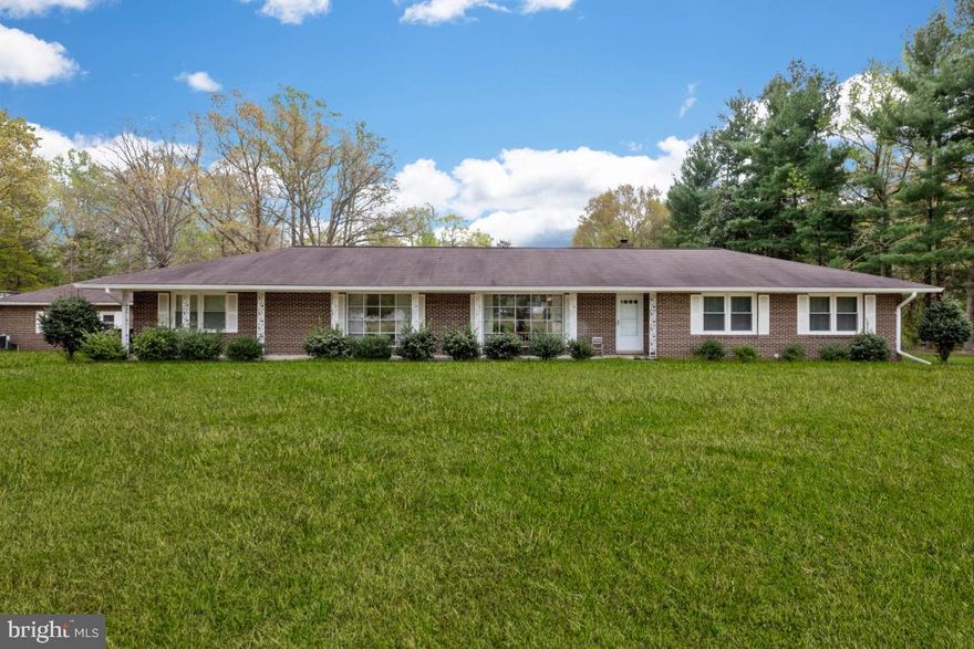 ONLY ONCE IN A WHILE DOES A PROPERTY THIS AWESOME COME ON THE MARKET FOR SUCH A GREAT PRICE*ALL BRICK RAMBLER JUST SHY OF 2,000 FINISHED SQUARE FEET*SITS ON AN OPEN AND TREE LINED 4.61 ACRES SITTING OFF THE ROAD FOR PRIVACY*SO MUCH HAS JUST BEEN REPLACED OR UPDATED IT S ALMOST LIKE NEW*OVERSIZE 1 CAR ATTACHED BRICK GARAGE*2 CAR DETACHED BRICK GARAGE*AMAZING 3 YEAR OLD METAL BUILDING *32 FEET WIDE, 52 FEET LONG AND 14 FEET HIGH*OVERHEAD GANTRY AND ELECTRIC HOIST IS PART OF THE BUILDING AND WILL REMAIN.  PORTABLE AUTO LIFT DOES NOT CONVEY BUT IS AVAILABLE FOR PURCHASE*THIS PROPERTY LENDS ITSELF TO SO MANY HOBBYISTS AND BUSINESS OWNERS*