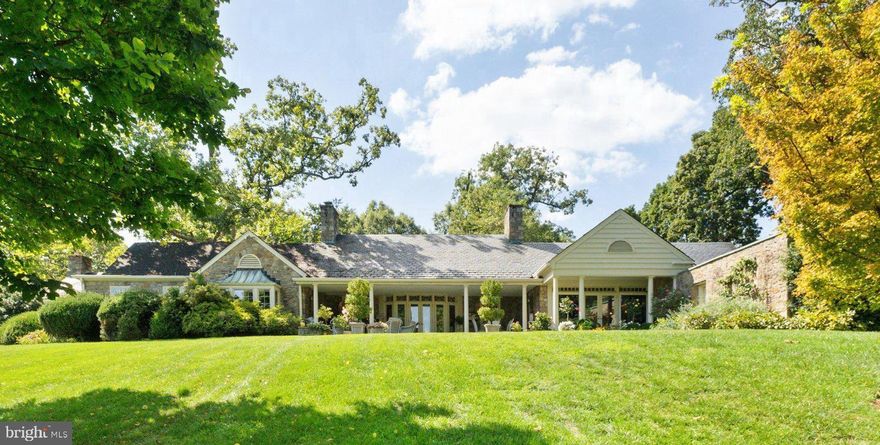 The handsome estate of Cloverwood encompasses 78 Acres, with frontage on both Zulla Road and Burrland Road. This is beautiful land which features large stands of professionally managed mature trees, the 4-acre Sherwood Lake, and board fenced paddocks and fields. In addition to the elegant manor house with a 20’ x 40’ pool, there is a guest house, 2 tenant houses, and 2 stables with a total of 26 stalls. Located within the prestigious Orange County Hunt territory, this property is also protected by an Open Space Easement with the Virginia Outdoors Foundation.
Sited to enjoy privacy and expansive views, the one-level manor house is built of stone with a Buckingham Slate roof, and features a large, covered, stone terrace on the back of the home. Originally built in 1946 by Master Builder W.J. Hanback, the manor home underwent a major renovation, designed by Tommy Beach in the 1980’s, and in 2015 a stunning kitchen renovation. From the front, one enters the spacious foyer which then opens into the elegant living room adorned with beautiful moldings, deep set windows, a wood burning fireplace, and a bowed wall of windows and French doors which open to the covered terrace. This terrace is extraordinary and enjoys an eastern exposure and protection from the elements, providing beautiful 3 season living and dining space. Returning to the living room, arched doorways lead to the other living areas of the home. To the right, one has access to the wet bar, library and 2 bedroom suites.  To the left, the doorways open into the dining room and the gourmet kitchen. The banquet sized dining room features a wall of windows and atrium doors which open to the terrace.  The stunning kitchen features wonderful workspace, granite countertops, an abundance of cabinets, and gourmet appliances including a Wolf 6 burner gas cooktop, Miele double ovens and warming oven, and Subzero Refrigerator and Freezer. The bay window with built-in seating creates an inviting breakfast nook, made even more inviting bathed in the afternoon sunlight. 
Beyond the kitchen and dining room, one has access to the guest suite, laundry and butler’s pantry/mudroom with direct access to the 2-car garage and storage. 
To the right of the living room, a hallway leads past a powder room and then to the primary bedroom suite and the second bedroom with full bath. The primary suite features a wood burning fireplace, beautiful built-in cabinetry, a wall of closets and 2 separate baths.
Between the bedroom hall and the living room is the charming library, ½ bath, and wet bar with ice maker. The library with heart pine cabinetry and shelving, features a lovely bay window with window seat, a wood burning fireplace and direct access to the back terrace.
Cloverwood is a gracious estate which encompasses quiet elegance and privacy. Located just minutes from historic Middleburg, this location affords easy access to Dulles International Airport and Washington, D.C.  
Note: Pool cover sold in "as is" condition
Accessory dwellings and structures:
Zulla Road Access:
Guest House: Just beyond the main home, a one-bedroom, 1 bath home offers wonderful privacy for your guest and features a living room with beautiful pond views, kitchen, 1 bedroom and 1 bath
Tenant House: Accessed from Zulla Road and tucked into the woods is a 3 bedroom, 2 bath home with living/dining room, kitchen and 1 car garage.
Stable with 14 stalls, 2 wash stalls, tack room, office and 2 bays for equipment
Fenced fields:
Outdoor riding arena
Run-in sheds:
Burrland Road Access:
Tenant House with 2 bedrooms and 1 bath
Stable with 12 stalls