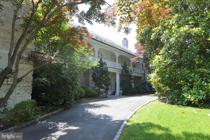 Absolutely gorgeous Belle Haven property offering 7  bedrooms, 5 full baths, 2 half baths sited on a large level lot with mature trees and landscaping. Elegant  entrance hall and formal rooms with exquisite moldings, spacious family room with a fireplace, cozy breakfast room with a fireplace and sitting area, elegant first floor bedroom with two bathrooms,  two car garage and spacious driveway