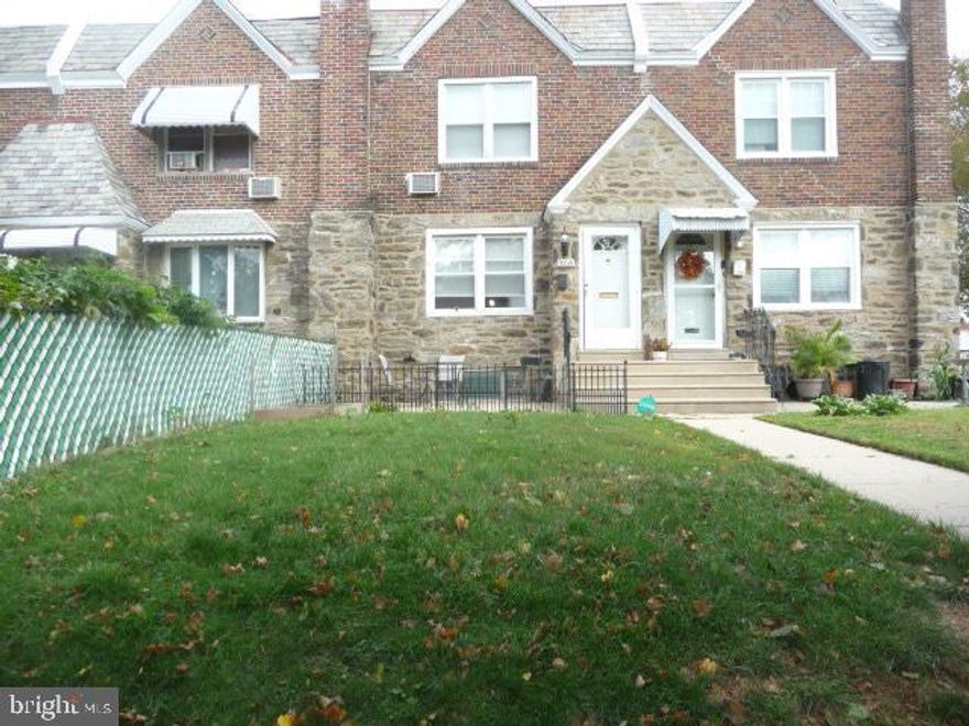 Great Mayfair location, 18' Stone and Brick airlite home, Front lawn and front concrete patio, Main level features foyer entry with coat closet, Living room with newer h/w flooring , Dining area with h/w flooring and  modern kitchen with island featuring sink and SS dishwasher, Kitchen has a wall of wood cabinets with SS gas range and newer SS refrigerator. Upper level features Primary bedroom , 2 other bedrooms and an updated hall bathroom. Lower level features a partially finished recreation area, laundry area with exit to rear driveway with 1 car parking. Garage has been shortened and is used for storage. Electric panel is located in the garage. Replacement windows t/o, newer heater & h/w heater. Convenient location near public transit, shopping, schools and major roads such as I95 and Rt ! (Roosevelt Blvd)