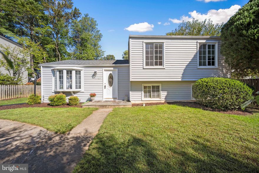 A PRICE IMPROVEMENT TO $669,900! Offered below tax assessment, this home is one of the best values in Burke. Located in the highly sought-after Burke Centre community, this residence is move-in ready with major updates already done for you.
Inside, you’ll find gleaming hardwood floors, brand-new carpet, and a fully renovated kitchen (2025)  with deep white cabinetry, quartz countertops, stainless steel appliances, and ceramic tile flooring with space for casual dining. Other recent upgrades include a new washer and dryer, new plumbing  (including main pipes in 2024), a newer roof, siding, and A/C—big-ticket improvements already completed.
The primary bedroom offers a rare walk-in closet next to the bathroom, giving you both ample storage and the potential to create another full bathroom. If not,  enjoy easy access to the adjacent  upgraded bathroom  with a skylight, bringing in natural light year-round while helping reduce electricity use.
The lower level adds even more living space, featuring a upgraded full bathroom, tile flooring throughout, and convenient walk-up stairs to the backyard. Step outside to enjoy the large yard—ideal for entertaining, gardening, or simply relaxing.
As part of Burke Centre, you’ll enjoy five community centers, multiple pools, walking and biking trails, tennis and basketball courts, tot lots, and wide-open green spaces. Everyday conveniences are nearby at Burke Centre Shopping Center and Burke Town Plaza, with grocery, dining, retail, and wellness services. Commuters will appreciate the Burke Centre VRE station, Metrobus/Fairfax Connector routes, Fairfax County Parkway, and I-495 for easy access to D.C., Arlington, and Tyson's Corner.
With extensive upgrades, modern features, a prime location, and this attractive new price—5703 Oak Stake Ct is a home you won’t want to miss!