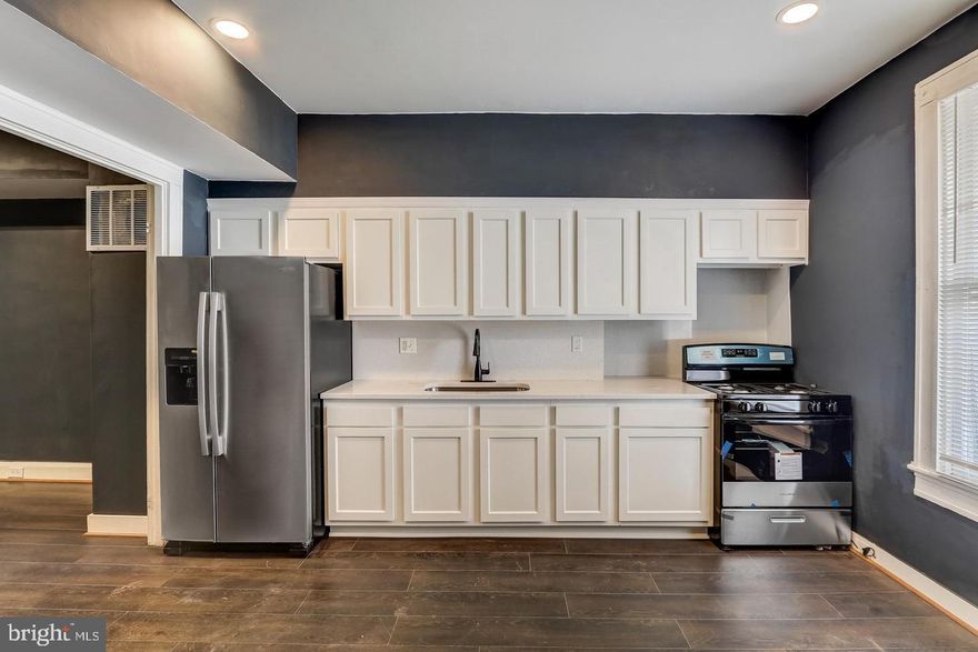 Welcome to your recently rehabbed 5 bedroom, 2 full bathroom, home in Ellwood Park. Only minutes from 895, 95, Baltimore County, and Downtown Baltimore City, this home boasts fresh paint, new flooring, a completely updated kitchen with new stainless steel appliances, marble counter tops, and updated cabinetry, 5 nice sized bedrooms, 2 completely renovated full bathrooms, plenty of on street parking, and 1 rear off street parking space. Owner is both source of income and credit history friendly so please don't hesitate to apply if your interested......... 610 N Bouldin could be your new home!