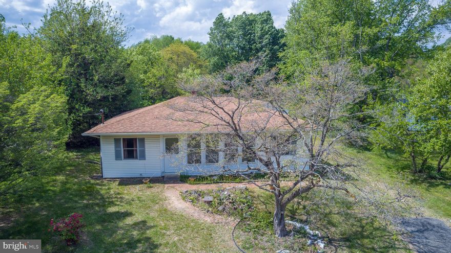 OFFER DEADLINE Please have all offers sent to Corrie Robinson by 10:00 AM Wed May 14th

This cozy 3-bedroom, 1-bath home sits on over an acre of land, offering ample outdoor space for relaxation and recreation. The property features both front and rear enclosed porches, perfect for enjoying the outdoors in comfort. 
While the home requires some renovation, it boasts updated roofing and drywall, providing a solid foundation for your enhancements. The detached garage adds extra convenience and storage options.
With a little creativity and effort, this property can be transformed into your ideal haven. Don’t miss the opportunity to make it your own! Schedule a viewing today! This home is being sold as is