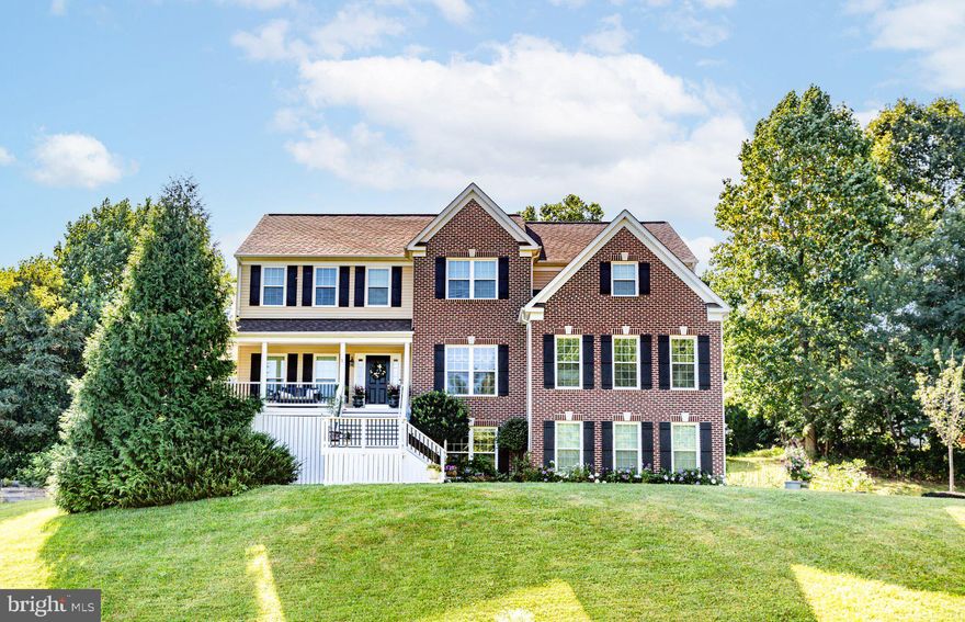 Welcome to your dream home, HGTV enthusiasts! This captivating 6-bedroom, 5 bathroom colonial residence is a true gem, boasting style at every corner. From the beautiful light fixtures, to the flooring choices, barn doors, bathroom fixtures to the amazing room sizes -  the list goes on and on. You won't need to do a single thing but move in.  Step inside to discover an almost fully finished basement as well, complete with a second kitchen, bedroom, family room, and full bathroom—an added bonus that sets this home apart. Experience the joy of modern living with a recently replaced roof and windows, ensuring both charm and functionality. The expansive driveway easily accommodates an RV, while the inviting rocking chair front porch sets the tone for the elegance within. Enter through a beautiful foyer leading to versatile office spaces and a stunning formal dining room with fabulous light fixture, perfect for entertaining guests. The two-story family room is a focal point with it's wall of windows, seamlessly flowing into the gourmet kitchen, which features upgraded cabinetry, appliances, and a spacious island complemented by exquisite marble countertops.  The pantry is LARGE, making this a space a chef will truly love. Indulge in the "Joanna Gaines" room on the main level, offering unique character and charm, along with a convenient main level bedroom and full bathroom. Upstairs, the primary bedroom is a sanctuary, adorned with beautiful barn doors, ample space, and abundant natural light streaming into the upgraded spa-like ensuite bathroom, complete with a luxurious shower, soaking tub, and dual vanities.  The walk in closet is just off this space as well. Each upstairs bedroom is generously sized, with one boasting its own private bathroom and two sharing a well-appointed hall bath. Discover delightful nooks and crannies throughout, adding to the home's allure. The almost fully finished basement presents endless possibilities, with a spacious recreation room, bedroom, full bathroom, and a remarkable kitchen with dining area—a perfect setup for an in-law or au pair suite. Outside, enjoy the tranquility of the deck space and private backyard—a serene escape in a superb location. The 2 car side load garage has newer garage doors and is a TRUE 2 car size garage.  Don't miss out on the opportunity to own this extraordinary home—why wait to build when you can embrace luxury and comfort right now?