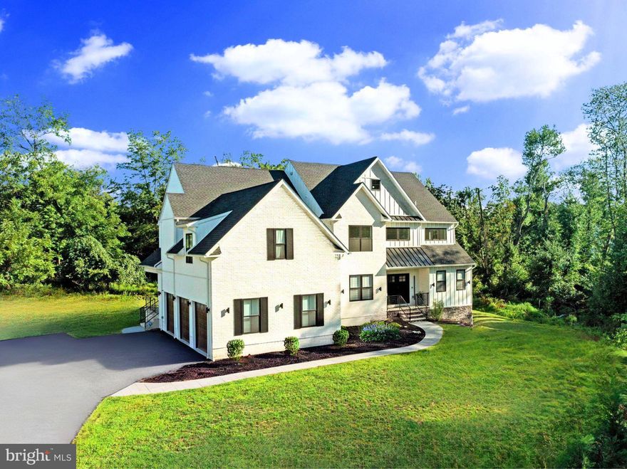 Proudly debuting 962 Tennis Avenue, where luxurious functionality meets sophisticated craftsmanship. Thoughtfully imagined by renowned architectural firm Morrissey, and handsomely constructed by Design Pro Development, every square inch of this home has been judiciously curated to satisfy your every need. Entirely turnkey, this newly completed contemporary home spans over 6200 sq ft and showcases exotic long leaf acacia hardwood flooring throughout.  Chic in style and exhibiting designer finishes across three spacious levels, the natural beauty of this home is undeniable. The European- inspired gourmet kitchen is simply stellar, with custom Aster Cucine cabinets delicately dressing the walls and smokey-grey quartz waterfalling over the generous center island. Ensuring every culinary need is accounted for, the entire kitchen is equipped with Bertazzoni stainless steel appliances which includes a gorgeous pro-series six-burner gas oven range with hooded ventilation.  The adjacent butler's pantry gracefully extends into the formal dining room, allowing for seamless entertaining and additional beverage refrigeration. A captivating great room with soaring ceiling heights enriches the open-concept floor plan, making this a comfortable space for friends & family to gather. With convenience in mind, the first floor also bestows an upscale In-Law Suite with full bathroom, private office, a mudroom with access to the attached three car garage and living room complete with a gas fireplace featuring a marble accent wall.  Upstairs, the exemplary Owners Suite is a showstopper.  Exuding luxury at every level, the massive primary bathroom hosts a double vanity, walk- in shower, porcelain soaking tub, golden inlay/star-patterned mosaic tiling and marble flooring.  A dedicated laundry room, the alluring ‘Princess Suite’,  as well as two additional bedrooms complete the upper level. Grab your pilates mat, lace up your running sneakers and head downstairs to the fully finished lower level, inclusive of your very own private gym, full bathroom and a deluxe kitchenette with bar seating. This additional space (approximately 1900 sq ft) is truly  an added bonus and can be utilized for whatever your heart desires.  The home also sports brand new mechanicals including two high efficiency propane hvac systems with NEST thermostat controls, Therma-Tru exterior doors and Energy Efficient Anderson windows.  962 Tennis Avenue is nestled amongst the finest of Ambler, PA and located only minutes from eclectic downtown shopping, refined dining, a variety of parks & nature preserves, hiking trails, top-rated schools, major commuter routes and the iconic Ambler Theater.  For those who desire a lifestyle built with timeless elegance and superior quality in mind,  your dream residence awaits.