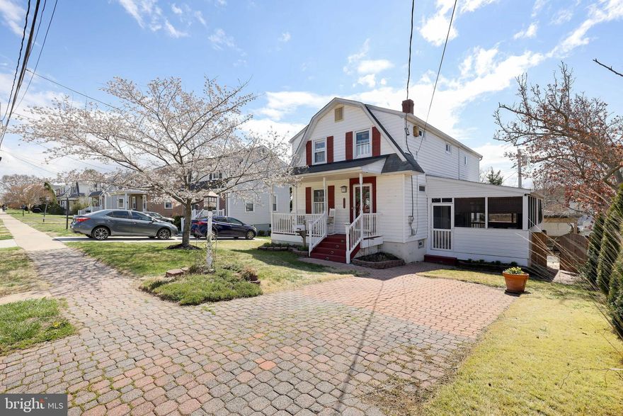 Charming porch front craftsman steps to the UMBC campus! Beautifully updated throughout including a two story family room/primary bedroom addition. Luxury vinyl floors, replacement window, crown moulding and recessed lighting in LR. White cabinets, stainless steel appliances, pantry cabinet and eating area in kitchen. Family room addition off kitchen with stack stone gas fireplace with lots of natural light. Four bedrooms on the upper  level includes a generous sized primary bedroom with vaulted wood ceilings, recessed lighting and en suite bath. Lower level with finished family room area and laundry room with additional storage. Amazing outdoor space with screened in porch, perfect for eating crabs and watching Ravens games! Covered pergola and wood deck adds to the entertainment space. Large shed can be used as a work shop and an additional shed for gardening tools. Paver driveway.