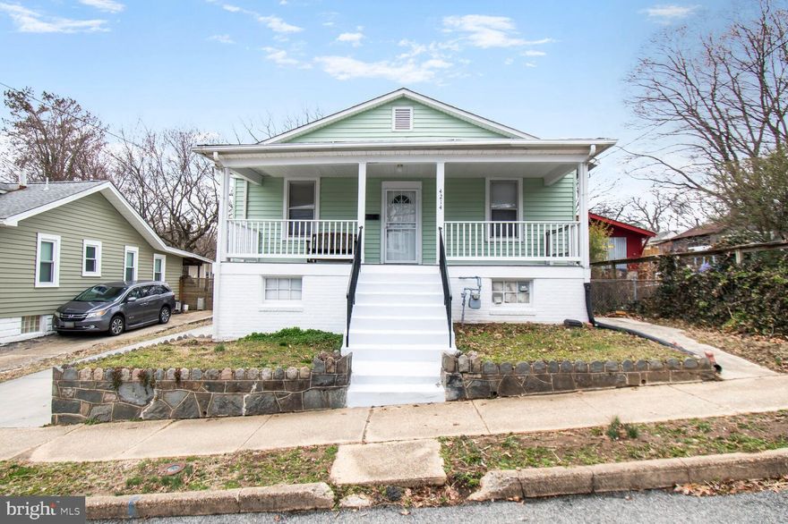 Bring your vision to this charming two level home on a spacious fenced lot. An elevated welcoming front porch provides a bird's eye view of the neighborhood.  A upper flexible floor plan offers three to four Bedrooms, an updated Bathroom and an extension overlooking the large, fenced yard.  The mostly finished Lower Level sits above the ground level offering two spacious Living Areas, one with recessed lighting, an unfinished Kitchen and a Full Bathroom. An unfinished space can be easily framed for additional storage. Two exits lead to the side and back yard.  Situated across from the lovely community park, and minutes to the DC border, trendy and local restaurants and shopping.  Lovingly cared for but sold strictly AS IS.