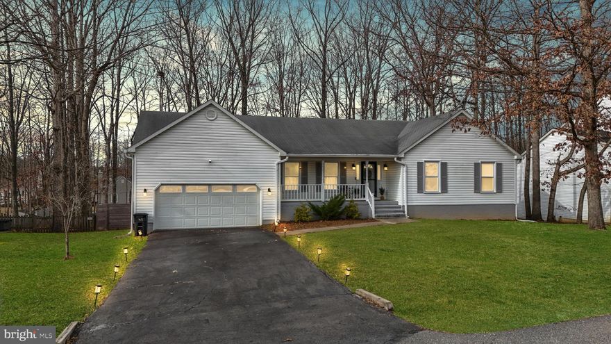 Welcome to this beautifully upgraded 4-bedroom, 3-bathroom rambler in the sought-after Smoketree community of Spotsylvania! With over 3,500 square feet of thoughtfully designed space, this home is all about comfort, convenience, and a lifestyle that embraces both relaxation and entertainment. From the welcoming front porch to the oversized rear deck, every corner of this home invites you to slow down and enjoy life.

Step through the front door, and you’re immediately greeted by a bright and airy living room just off the foyer—a perfect spot for welcoming guests or enjoying a quiet morning with a cup of coffee. The heart of the home is the spacious kitchen, where stainless steel appliances, abundant cabinet space, and a cozy breakfast nook create an ideal space for everything from casual meals to meal-prep marathons. The kitchen flows effortlessly into the dining room and family room, creating an open yet distinct layout that makes hosting a breeze. Large windows and glass sliding doors let in an abundance of natural light and lead straight to the expansive deck—perfect for outdoor gatherings or just soaking up a little fresh air at the end of the day.

The main level is designed for ease and comfort. The generous primary suite features an ensuite bath and ample closet space, providing a peaceful retreat at the end of the day. Two additional bedrooms and a full hall bath offer plenty of room for whatever you need—guest space, a home office, or simply extra room to spread out.

But the perks don’t stop there. The finished walkout basement is a showstopper. With a huge recreation room, you have endless possibilities—set up a game room, a home theater, or a personal fitness studio. A private fourth bedroom and full bath make the lower level a fantastic option for guests, in-laws, or an additional suite for privacy and convenience. And let’s not forget the dedicated storage room—because you can never have too much space for holiday decor, seasonal gear, and all those extras you want tucked away but easily accessible.

Step outside, and you’ll find even more reasons to love this home. The fully fenced backyard offers privacy and security, whether you’re entertaining friends, gardening, or simply unwinding in your own outdoor oasis. The oversized deck is the perfect spot for summer barbecues, stargazing nights, or crisp autumn mornings with a warm drink in hand.

And let’s talk about location—because this home delivers on that too. You’re just five minutes from Harrison Crossing and Central Park, putting shopping, dining, and entertainment right at your fingertips. Need to get somewhere fast? Quick access to I-95 makes commuting or weekend getaways a breeze.

This home is more than just a place to live—it’s a place to thrive. With thoughtful upgrades, ample space, and a layout that balances function with style, this Smoketree rambler is ready to welcome its next owner. Schedule your private tour today and see why this home is everything you’ve been waiting for!