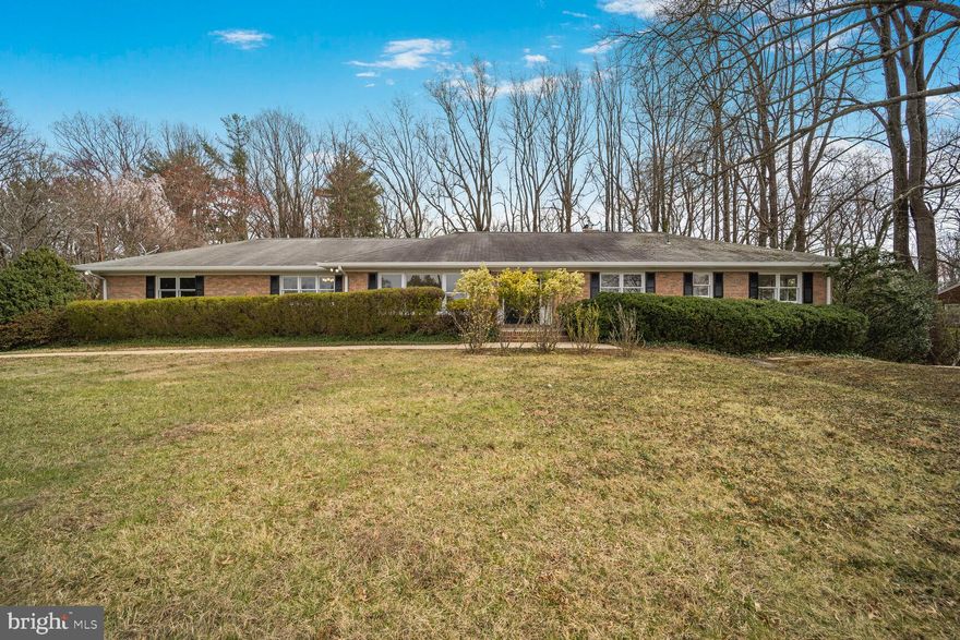 Located in the sought after Brook Hills Estate neighborhood in Annandale, this sprawling 5BR/3.5BA rambler unveils a harmonious blend of comfort and elegance, sitting on a large one acre lot. 
As you walk in, the heart of the home is the inviting family room, adorned with a cozy fireplace that adds warmth and ambiance. Adjoining the family room is the fully equipped kitchen, making it ideal for entertaining guests or preparing meals. Walking out of the family room, the expansive patio and deck offers a perfect spot for al fresco dining, summer barbecues, or simply relaxing and enjoying the fresh air, where you can bask in the tranquility of the private backyard.
The large living room and adjacent dining room offer more options to entertain, enjoy a quiet time at home, and build memories with your loved ones. The laundry room across the hallway offers an extra convenience on this level.
On the other side of the foyer, the main level of the home features three well-proportioned bedrooms and two full bathrooms and a powder room, providing ample space for rest and relaxation. The primary bedroom is a true sanctuary, boasting an en-suite bathroom and a large walk-in closet. The additional two bedrooms are equally comfortable and share access to a full bathroom. 
Descend to the lower level to discover a fully finished basement that adds even more living space to this exceptional home. Here, you will find two additional bedrooms, perfect for guests, and a home office. A spacious recreation room offers endless possibilities for entertainment, whether it's movie nights, game days, or simply gathering with loved ones. An additional kitchen and full bathroom add convenience and functionality to the basement level. 
Outside, the property boasts an attached two-car garage and ample driveway parking, ensuring there's always a place for your vehicles. 
In terms of location, this rambler is ideally situated within a short distance of the Beltway with easy access to anywhere in the metro area. For those who love shopping, dining, and entertainment, the bustling towns of Annandale and Springfield are just a short drive away. 
Whether you're looking to raise a family, entertain guests, or simply enjoy a serene lifestyle, this home is sure to exceed your expectations.
Offer deadline: Tuesday, April 1st at 3:00 pm.
