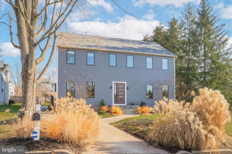 Welcome to an extraordinary residence in Newtown Borough, a rare opportunity that seamlessly blends the historic charm of this highly coveted area with modern luxury. This single-family home stands as a testament to the perfect harmony of classic architecture and contemporary sophistication. 
Enter this remarkable home through a unique and stylish front door, into a majestic two-story foyer, where a breathtaking chandelier attracts attention and sets the tone. The dining room, adjacent to the foyer, seamlessly flows into a large kitchen, boasting an oversized island that becomes the heart of this culinary haven. Complete with a gas range and a wine bar, the kitchen is not just a space for cooking but a social hub where family and friends can gather. With ample seating at the island, it's the perfect setting for both casual meals and sophisticated entertaining. On the opposite side of the home, an elegant living room invites creativity and relaxation. The expansive space provides homeowners the flexibility to design and arrange according to their tastes, making it a versatile area for various activities and personal expressions. Returning to the main foyer, a grand staircase beckons, leading to a spacious upstairs haven featuring five bedrooms and four full bathrooms. The master suite is a true retreat adorned with exposed beams, a walk-in closet, and breathtaking bathroom. The dream bathroom is a sanctuary of luxury, boasting an oversized shower, a standalone tub, and a personal sauna, all while enjoying wrap-around windows with views of verdant surroundings. The entire home exudes modern luxury, with updates evident in every corner, and oversized windows throughout ensure that every room is bathed in natural light, creating an ambiance of warmth and sophistication. 
Not to be overlooked is the spacious yard this home offers in Newtown Borough, with an updated patio space for enjoyment in warmer months. Also located in the rear of the home is the two car attached garage not visible from the street. 
Venture further away from the yard and immerse yourself in the rich history of the neighborhood, where the historic markers tell tales of days gone by, while enjoying the convenience of walkability to a vibrant town. Indulge in local delights with charming restaurants, coffee shops, fashion boutiques, cigar, flower, and cake shops, and even an old movie theatre, all just a stroll away. 
For more adventure, this home is conveniently located near major highways and is a short commute from Princeton and Philadelphia, and less than 2 hours from NYC or the Jersey Shore. Experience modern living at its finest with updated appliances, including HVAC, ensuring both comfort and efficiency. This home invites you to enjoy the perfect blend of history and luxury, creating a living space where every detail has been thoughtfully considered. Welcome to a residence where the past meets the present in perfect harmony. Don’t wait to come see this opportunity..