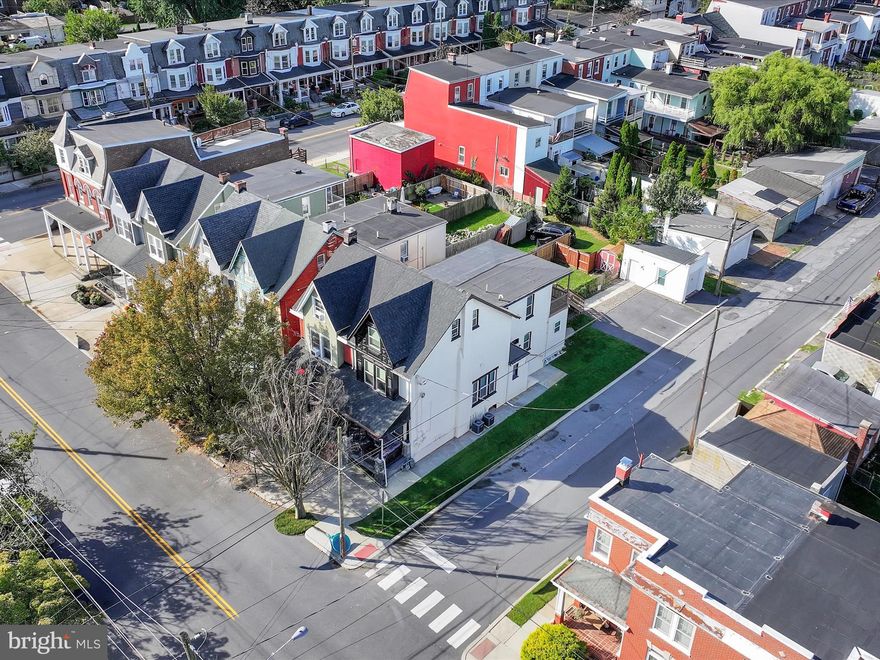 Exceptional opportunity to own a well-maintained and updated two-family home in a prime location, perfect for investors seeking strong rental income or owner-occupants looking to offset mortgage costs. This turnkey property features a sunlit first-floor 1-bedroom unit with charming hardwood flooring, an updated kitchen with granite countertops, breakfast bar, gas stove, and in-unit laundry. Currently rented month-to-month at $1,500/month, this unit offers immediate income with potential for future rent increases. 

The second-floor unit boasts two spacious bedrooms plus a flexible third room ideal for a home office, guest room, or media space. It features brand-new flooring throughout, a modern kitchen with granite countertops, breakfast bar, built-in dishwasher, and private in-unit laundry—making it completely move-in ready. The seller currently lives in the second unit and projected rents for this unit is $2,200+/month. 

Additional highlights include three off-street parking spaces, a detached one-car garage (with an EV Charging Station) for storage or added income, and separate utilities for each unit, allowing tenants to pay their own bills. All major appliances—refrigerators, washers, dryers, and more—are included in the sale. The property’s low-maintenance exterior and well-kept interior finishes reduce upkeep while maximizing appeal for tenants and owners alike. Located just minutes from the hospital, major highways, top restaurants, shopping centers, and the train station, this property offers exceptional commuter convenience and long-term value. Whether you're looking for a high-performing investment or a comfortable home with rental income, this multi-family residence checks all the boxes.