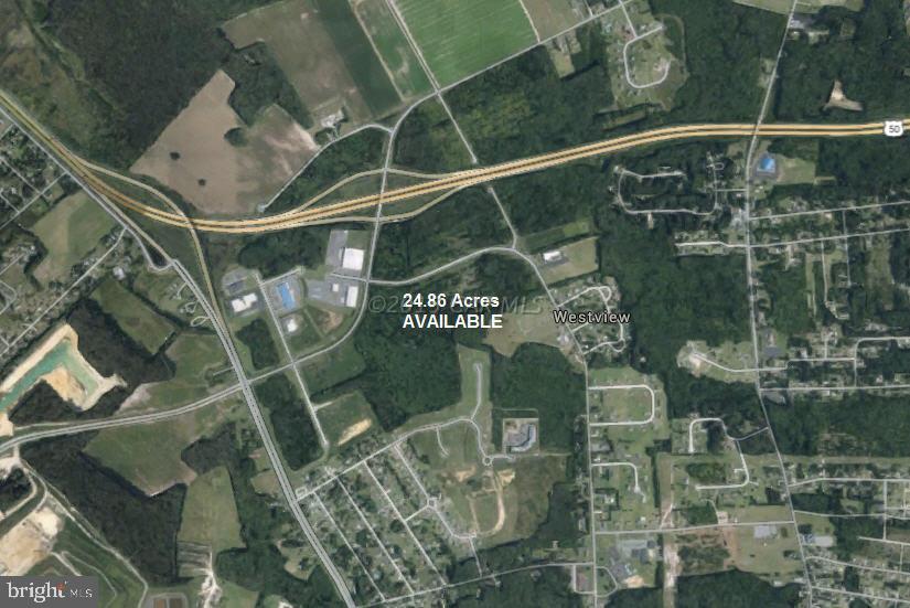 Located on West Road just off Naylor Mill and the Route 50 Bypass. This parcel is included in the original planned development district of Westwood but has not yet been developed. Offering excellent location and access at a tremendous price reduction. Enterprise zone tax credits available at only $40,000 per acre. Will consider subdivision. Multi use PDD zoning code.