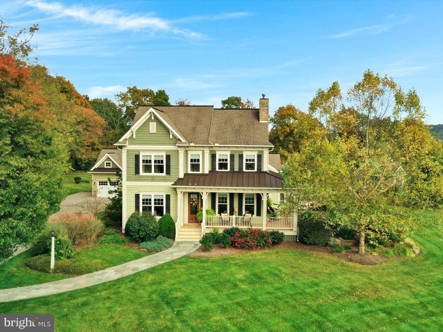 Have you been looking for a one of a kind property? This is it, your chance to own this custom Craftsman Home situated on a total of 10 acres bordering preserve land. Five of those acres are on a separate deed and in Clean and Green. Can be a future homesite or build a barn for your horses. Walk up the cobblestone driveway to this elegant home featuring a Manny Beiler kitchen with soft close cabinets, granite counter tops, island, breakfast bar, Brubaker stainless steel appliances, double oven, gas cooktop, pot filler, butlers pantry with microwave and cable outlet, full walk in pantry, crumb catcher, and don't miss the under cabinet and floor lighting. Breakfast area overlooks a very country view.  Living room with gas fireplace, first floor family or billiard room with built ins by Manny Beiler, transom windows, coffered ceiling and gas fireplace for the cozy winter nights. First floor office features coffered ceiling and built in closet. Formal dining room with tray ceiling and underlighting also open to living area. First floor laundry room, mudroom area with built in bench and cork flooring. Primary bedroom is as good as it gets, featuring a cozy fireplace, large walk in closet with lots of built in cabinetry and shelving, primary bath has a tile shower with massage multi jets, 2 heads. Whirlpool tub-reheater , tile flooring and transom windows. Sound system throughout home too. Living space does not end there, additional 2283 square feet to enjoy an in home theatre with underlighting, full kitchen, family room area with gas fireplace, brick vineer flooring and berber carpet, built in bookshelves. There is a 1/2 bath with a vessel sink. Large storage area with outside entrance. The second floor of this home has  an additional two bedrooms, Jack and Jill bathroom with walk in shower, granite sink top and flooring. This part of the home has it own separate sound system.  Step outside and take in the view from your wrap around porch and patio area with built in grill. Beautiful fish pond to sit and relax by. Walk the path to the 8' deep heated Pebbletech pool with waterfall features, rain garden, outdoor fireplace and sitting area. Don't miss the pool house with its own flagstone patio, kitchenette, soft close cabinets with built in trash bin, tile floor, heated and air conditioned,  cable TV and separate sound system, recessed lights and dimmers. A changing room too. There is a three car garage with central vacuum, geothermal heating, full house generator, irrigation system across the back of home. Set up your private today!